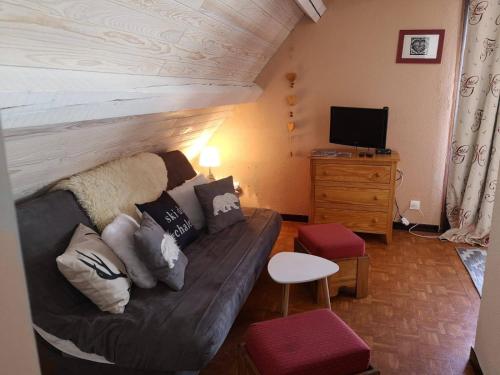 Appartement Cosy 4 à 6 places - cœur de station - vue Montagneにあるシーティングエリア