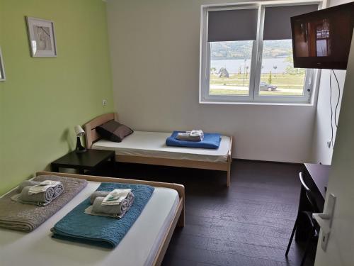 Postel nebo postele na pokoji v ubytování Apartman Terassa