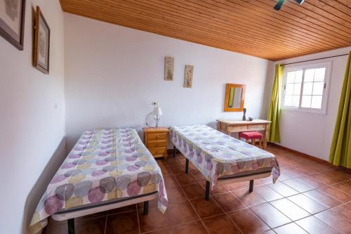 Postel nebo postele na pokoji v ubytování Casa Unifamiliar