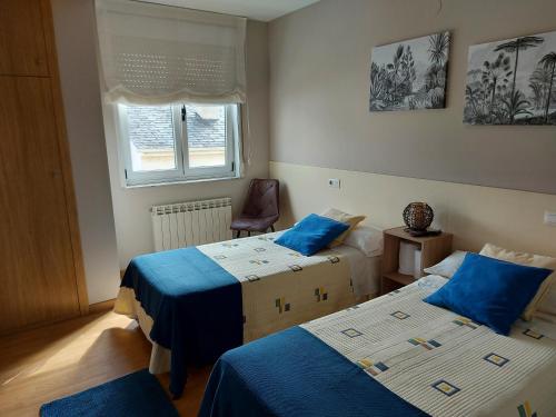 A bed or beds in a room at Ultreia