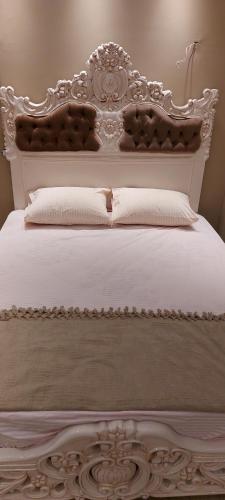 Postel nebo postele na pokoji v ubytování كمباوند جاليريا مون فالي