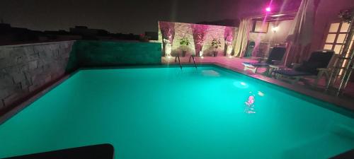 Bazén v ubytování كمباوند جاليريا مون فالي nebo v jeho okolí