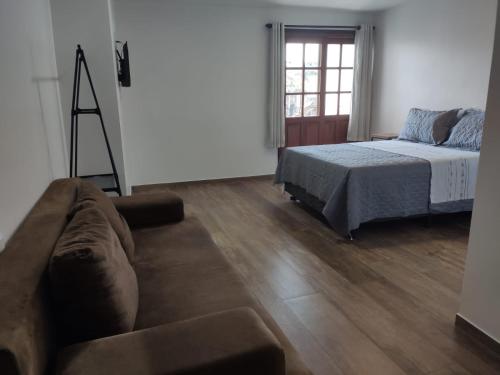Cama ou camas em um quarto em Bahia Pelô Hostel