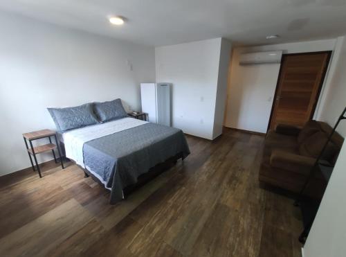 Postel nebo postele na pokoji v ubytování Bahia Pelô Hostel