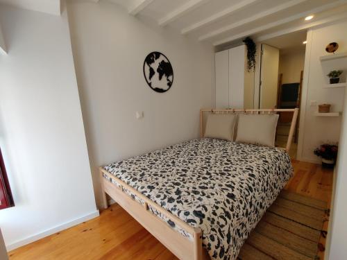 Voodi või voodid majutusasutuse Cais de Gaia Historic Loft toas