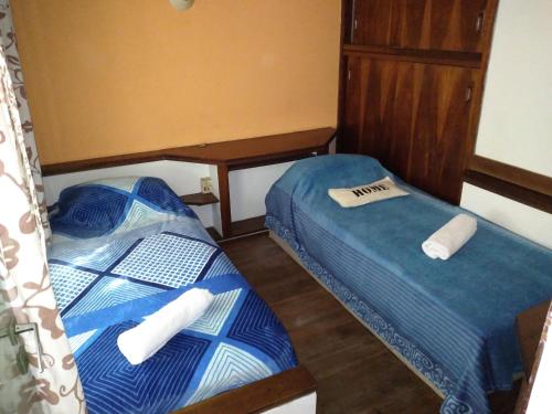 Postel nebo postele na pokoji v ubytování T&A RESIDENCE Aeropuerto Ezeiza