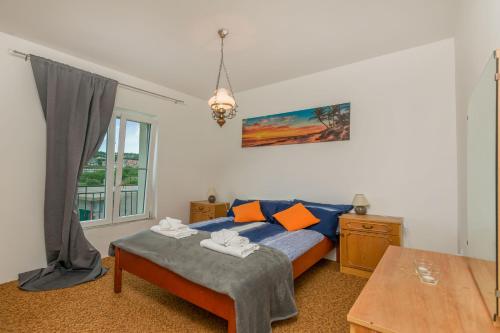 Postel nebo postele na pokoji v ubytování House Cattleya