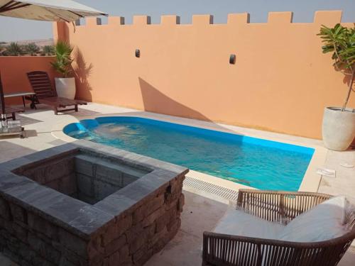 Bazén v ubytování Desert Inn Resort and Camp nebo v jeho okolí