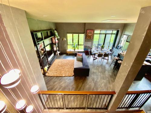an aerial view of a living room and dining room at Faizal Madhi Homestay in Kuching