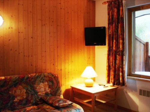TV a/nebo společenská místnost v ubytování Cosy at L'Atrey La Tania
