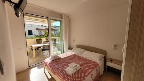 A bed or beds in a room at Antares
