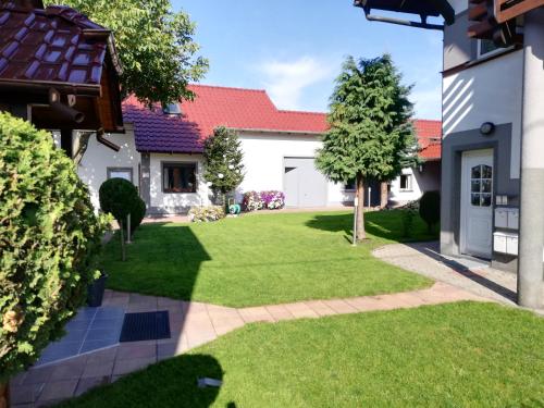 an image of a yard with a house at Bella Patria in Rozwadza
