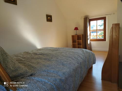 Postel nebo postele na pokoji v ubytování Maison cosy au cœur du Lochois