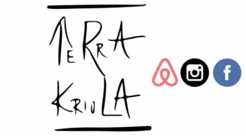 Terra Kriolaに飾ってある許可証、賞状、看板またはその他の書類