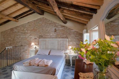 Katil atau katil-katil dalam bilik di Borgo dei Gatti Albergo Diffuso