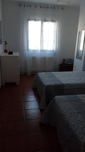 Ένα ή περισσότερα κρεβάτια σε δωμάτιο στο Villa Family Kids "Joropillo" - Full house rent