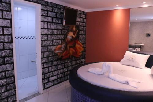 Ένα μπάνιο στο Hotel 1001 Prime - Ceilândia