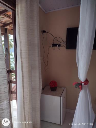 Televisyen dan/atau pusat hiburan di Pousada Mar de Araçatiba