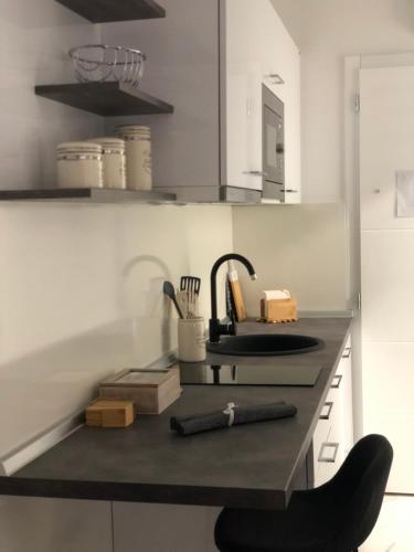Dapur atau dapur kecil di Studio apartman Rose