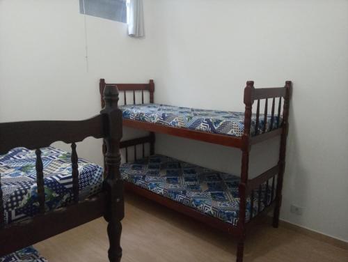 Двох'ярусне ліжко або двоярусні ліжка в номері Bruno Conde Casa na praia