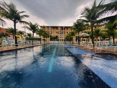 Πισίνα στο ή κοντά στο Loft Condado Bl 2 Ap 116 Aldeia dos Reis Sahy