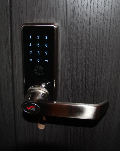 a close up of a door handle on a door at Apartament Kattowitz in Katowice