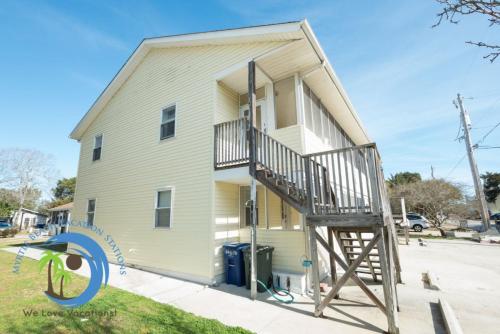 a house with a staircase on the side of it at Windy Hill Villa 2 - Beach Retreat in Myrtle Beach