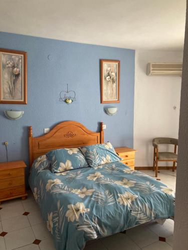 Ein Bett oder Betten in einem Zimmer der Unterkunft Hostal Ruta Del Sur