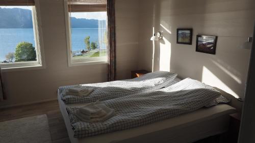 Säng eller sängar i ett rum på Klævold utleigehus