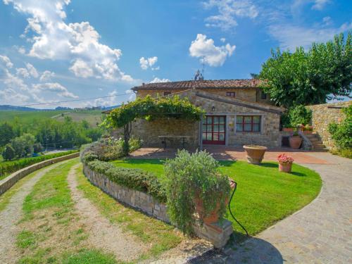 a stone house with a garden in front of it at Holiday Home Locazione Turistica Selvapiana by Interhome in Greve in Chianti