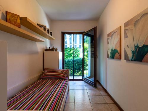 Holiday Home Candida by Interhomeにあるベッド