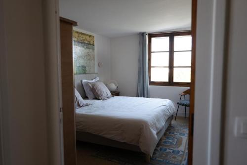 Katil atau katil-katil dalam bilik di Superbe T4 vue mer à Royan, 2 min à pied des plages