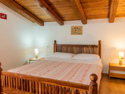 Postel nebo postele na pokoji v ubytování Holiday Home Casale Ai Noccioli - LVC165 by Interhome