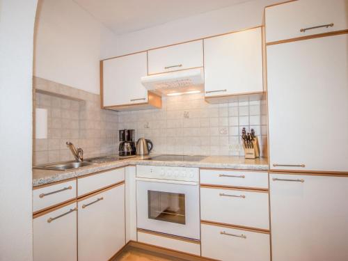 Kuchyň nebo kuchyňský kout v ubytování Apartment Venier by Interhome