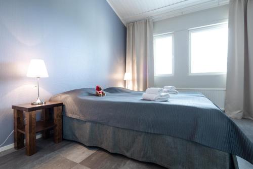 Postel nebo postele na pokoji v ubytování Kumpare apartments