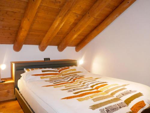 Säng eller sängar i ett rum på Holiday Home Rustico Gianni by Interhome