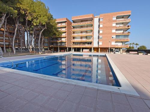 The swimming pool at or close to Apartment Els Pins Eduardo-7 by Interhome