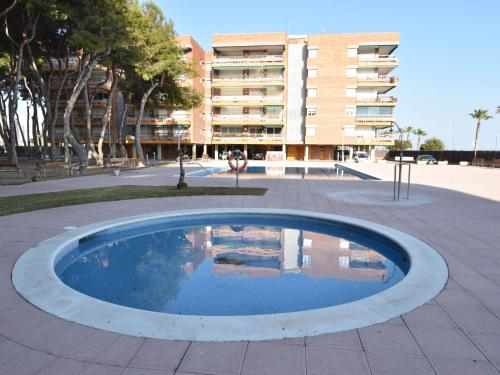 The swimming pool at or close to Apartment Els Pins Eduardo-7 by Interhome