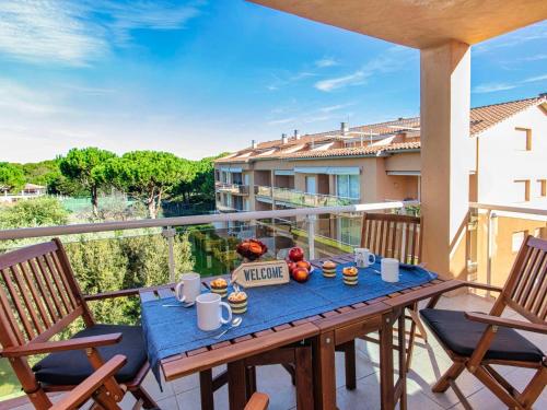 a table with food on top of a balcony at Apartment Sa Guilla by Interhome in Pals