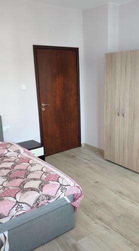 Postel nebo postele na pokoji v ubytování LILIYA Apartment