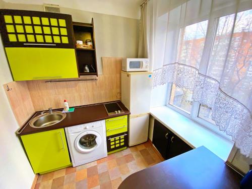 Kjøkken eller kjøkkenkrok på Baykal Apartments on Dekabristov