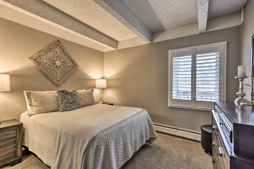 a bedroom with a bed and a window at Modern Condo 2 Blocks to Main Street Frisco! in Frisco