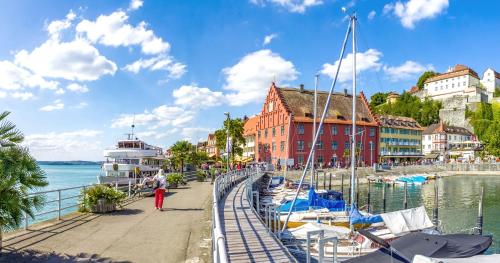 a group of boats docked at a marina at Familien-Apartment 1 in Meersburg