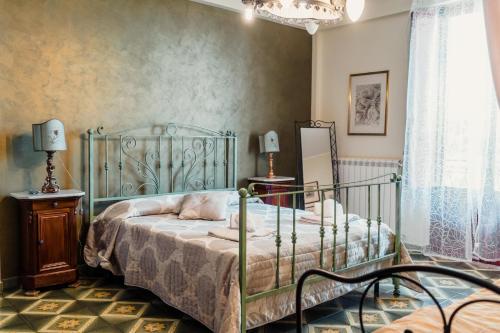 Кровать или кровати в номере B&B Elvira Al Duomo
