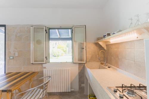 Kuchyň nebo kuchyňský kout v ubytování Bio Agriturismo Salos