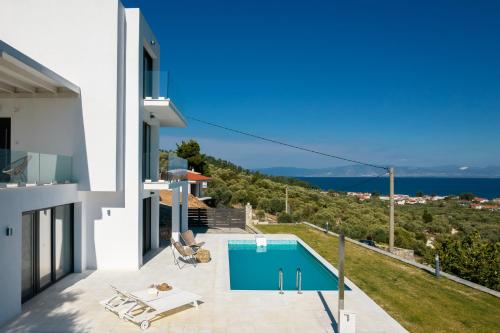 Gambar di galeri bagi Hillside Villa - Thea di Limenas