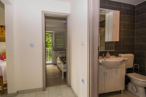 Koupelna v ubytování Apartments Relax near Opatija