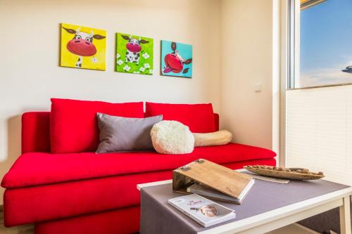 Apartment Motzenhof - Stadtnähe Salzburg - modernes Bauernhoferlebnis inklusiveにあるシーティングエリア