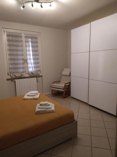 Postel nebo postele na pokoji v ubytování nido di dafne