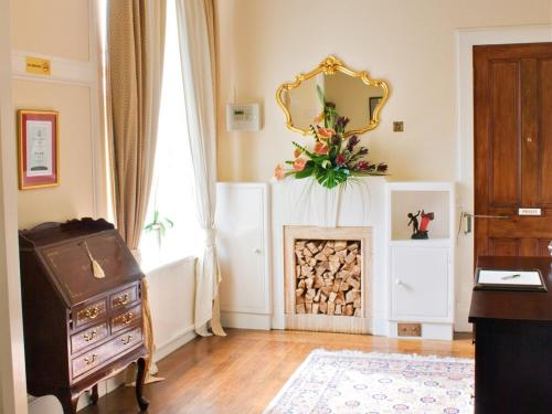 A television and/or entertainment center at Hartfell Guest House 